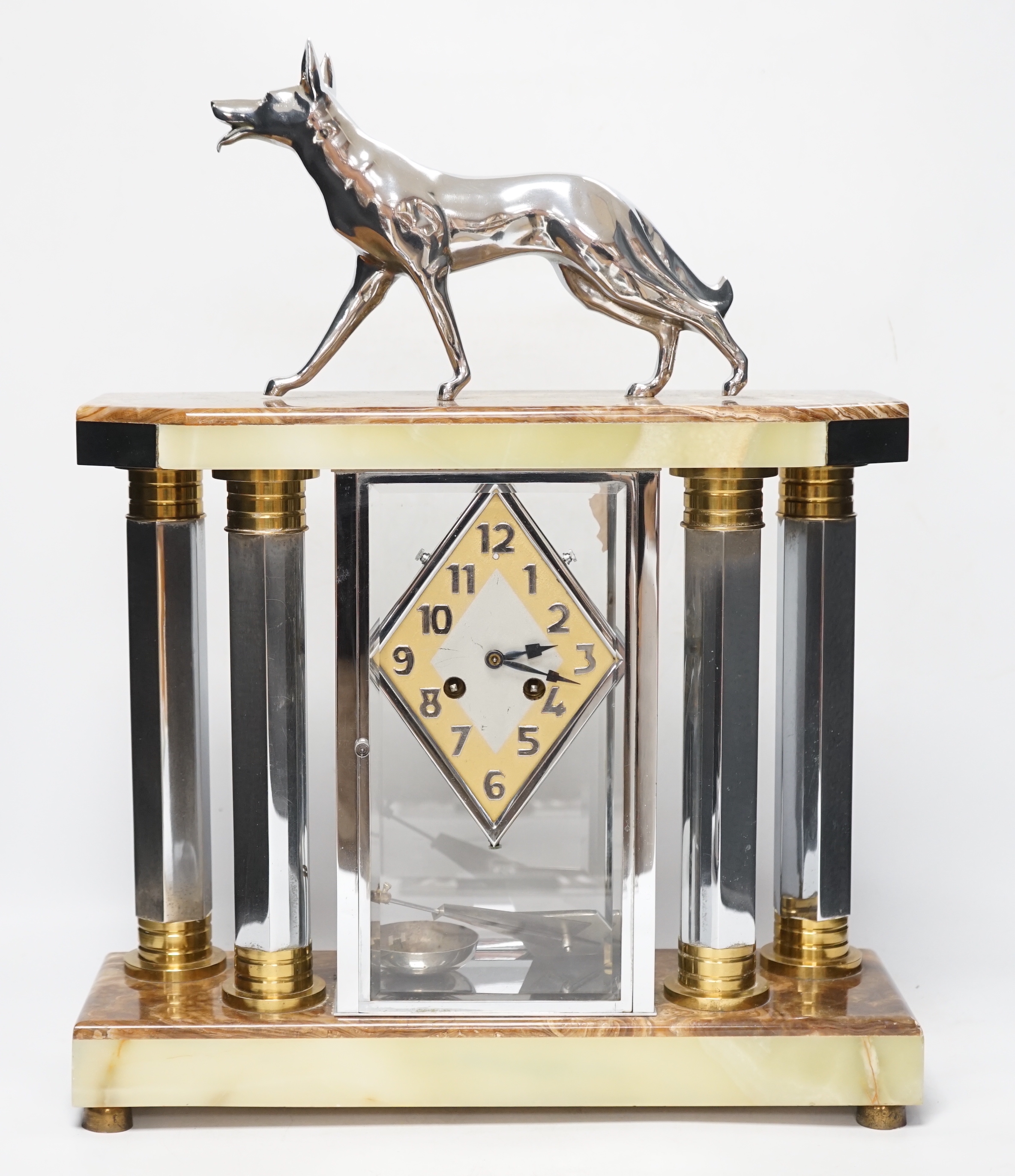 A French chrome, bronze and marble Art Deco 4 glass clock with two pedestal vase garnitures and a Wolf mount, attributed to Michel Decoux